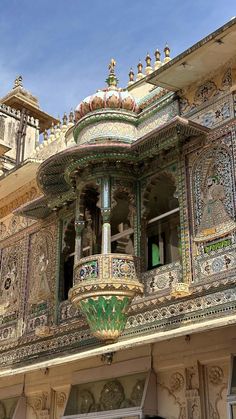 an ornate balcony and balconies on the side of a building with intricate designs