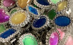 there are many different colored glass rings