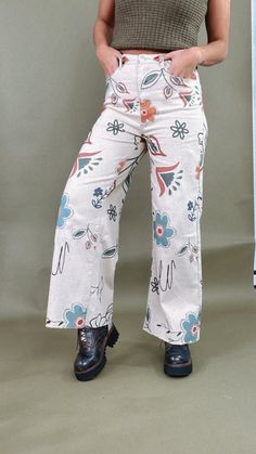 Make a statement this fall in our Happier Days Floral Printed Wide Leg Pants. These boho-style printed pants are going to be your go-to this fall - featuring a boho print throughout, a leg-relaxed fit, and an unfinished hem. Floral wide-leg pants Functional pockets Button + Zipper closure Relaxed fit Wide legs 98% Cotton, 2% Spanxdex Measurements: Measured lying flat S: Waist: 28” | Rise: 11 1/2” | Hip: 38” | Inseam: 28 1/2” M: Waist: 30” | Rise: 12” | Hip: 40” | Inseam: 29” L: Waist: 32” | Rise Style Wide Leg Jeans, Printed Wide Leg Pants, Exclusive Dress, Pants Large, Dresses By Length, Boho Print, Wide Legs, Bottom Clothes, Printed Pants