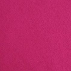 a close up view of a bright pink background