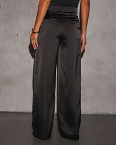 Sheen, smooth satin for date night? Yes please! It's our favorite way to enter the evening, in our Shannell Satin Trouser Pants. These pants fit to flatter with a wide leg, high structured waistband and sleek, slip pockets. Fits true to size High rise structured waistband with belt loops Wide leg fit Front slip pockets & back faux pockets Smooth, shiny satin fabric Front zip fly & button closure Black Satin Pants Outfit, Satin Pants Outfit, Western Office, Satin Trousers, Satin Pants, Pants Fit, Swimwear Bottoms, Romper Dress, Yes Please