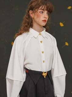 A long shirt with a beautiful golden fox clasp.
 The design of the loose sleeves and the long length will give you a stylish look. 
The sharp eyes of a golden fox shining in the middle of a simple shirt make this an impressive item that will catch the eye of anyone who sees it.



 You can purchase the belt here .



 <color>



 olive green

 off white






 <Size>





 small size






 Length: 73.5cm

 Bust: 102cm

 Sleeve length: 74.5cm




 medium size



 Length: 75cm

 Bust: 106cm Gold Long Sleeve Shirt For Fall, Elegant Gold Shirt For Fall, Elegant Gold Fall Shirt, Gold Shirt With Buttons For Fall, Chic Gold Formal Shirt, Gold Long Sleeve Shirt With Buttons, Gold Long Sleeve Tops With Buttons, Gold Long Sleeve Tops With Button Cuffs, Nordic Fairy