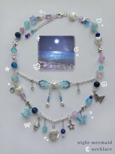 Hello! We are a new small business on Etsy. This piece is a detailed, handmade pearl, blue and purple necklace, inspired by mermaids and the sea. Made with mainly glass, as well as acrylic and metal beads/charms. Has 2 colored (blue) agate beads. ✦ For more information, read our bio! ✦ Feel free to reach out if you have any questions, criticism or concerns. - Tik Tok: @kolorijewellery Blue And Purple Jewelry, Ethereal Mermaid, Homemade Necklaces, Diy Earrings Easy, Cool Things I Want, Creative Necklace, Dragonfly Bracelet, Sea Necklace, Aesthetic Diy