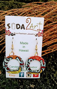 the earrings are made in hawaii and have colorful designs on each earring, which is also available for purchase