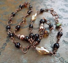 "Thank you for looking at RustandSalt. I truly appreciate your visit and taking the time to look around my shop. I hope you find something you like, and that speaks to you. Smoky Quartz Crystal and Czech Glass Brown Hand Forged Copper Link Chain Necklace. This necklace is 25\" long. Made with 18 gauge copper. Substantial, quality necklace. The smoky quartz I used for this are beautiful high quality clear tea brown. Thanks for looking." Quartz Point Necklace, Smoky Quartz Necklace, Brown Hand, Bali Silver, Bracelets Design, Electroformed Jewelry, Smoky Quartz Crystal, Wear Necklaces, Artisan Earrings