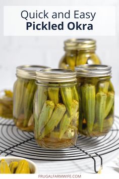 pickled okra in jars on a wire rack with text overlay reading quick and easy pickled okra