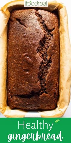 a close up of a loaf of bread in a pan with the words healthy gingerbread