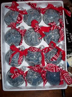 a box filled with lots of ornaments on top of a table