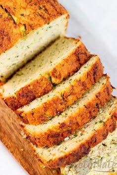 sliced loaf of zucchini bread sitting on top of a cutting board