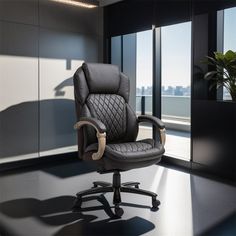 an office chair sitting in front of a window