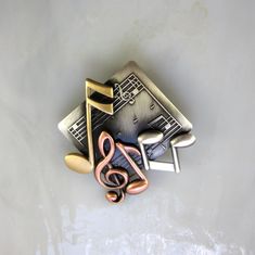 "Beautifully detailed brass stampings are soldered together to create this Brooch. A thick anti-tarnishing plate is professionally plated, oxidized to bring out the intricate detail in each piece, hand satined and lacquered to further insure this will never tarnish. No special care is required. Amazingly lightweight. The mixed metal combination of copper, silver and brass create depth, contrast and realism. Measures 1 3/4\" x 1 3/4\" Gift Boxed Thank you for visiting my shop and please come agai Gifts For Musicians, Music Teacher Gift, Music Collage, Music Teacher Gifts, Music Jewelry, Musical Notes, Cool Pins, Musical Note, Music Gifts