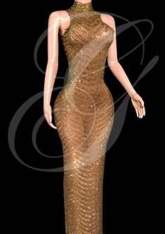 a mannequin wearing a gold dress with sequins