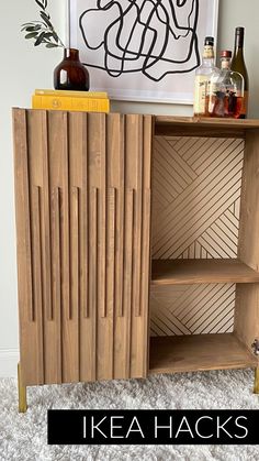 a wooden cabinet sitting on top of a carpeted floor