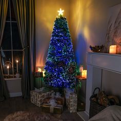 a lit christmas tree in a living room