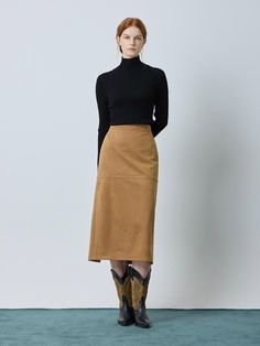 This luxurious suede H-line skirt in camel features elegant seam lines and thoughtful stitching details, complete with a practical back slit for ease of movement. The versatile piece can be perfectly paired with its matching jacket (C244PSF513) to create a sophisticated coordinated ensemble. Crafted from a premium polyester-polyurethane blend with a full polyester lining, this skirt offers both style and comfort in sizes 55 and 66, with a flattering midi length of approximately 82cm.Country of O Chic Relaxed Fit Brown Pencil Skirt, Chic Brown Relaxed Fit Pencil Skirt, Olive Skin, Stitching Details, Line Skirt, Jeans Style, Midi Length, Dream Closet, Camel