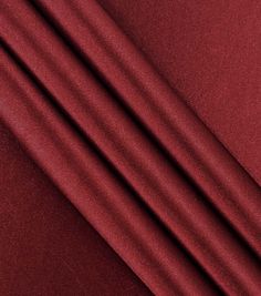 a close up image of a red fabric