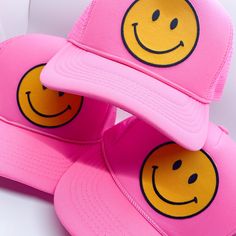 Keep it trendy with this new smiley face patch trucker hat! A best-seller, these hats are adjustable and can fit just about any head. They're super comfortable too. The smiley face patch is sure to keep you smiling all day long! Trendy Trucker Hat For Outdoor, Trendy Smiley Face Cap, Adjustable Smiley Face Cap, Adjustable Baseball Cap With Smiley Face, Trendy Smiley Face Baseball Cap, Fun Smiley Face Cap, Trendy Smiley Face Hat With Curved Brim, Trendy Smiley Face Baseball Cap With Curved Brim, Trendy Curved Brim Hat With Smiley Face