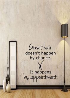 a wall with a quote on it that says great hair doesn't happen by chance