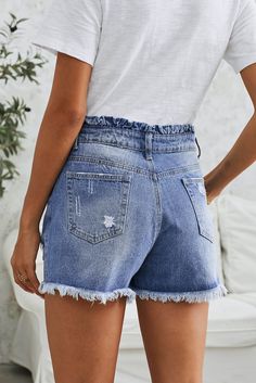 Shorts fit with a high rise, relaxed fit, and no stretch fabrication, medium wash with subtle fading and whiskering. A soft ruffled waistband completes the look. Sizes: Small 0-4 Medium 6-8 Large 10-12 X Large 14-16 Model is 5'6'' wearing size small. Length of small approx. 15''. 100% Cotton Shorts Fit, Mom Shorts, Denim Shorts, High Rise, Relaxed Fit, Womens Shorts, Boutique, How To Wear, Fabric