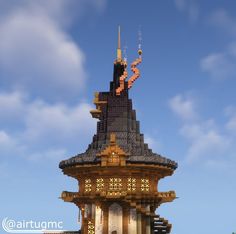 a tall tower with a clock on the top