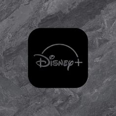 the disney plus logo is shown on a black square with grey marble textured background