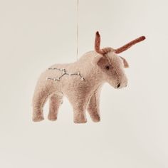 a stuffed animal hanging from a string