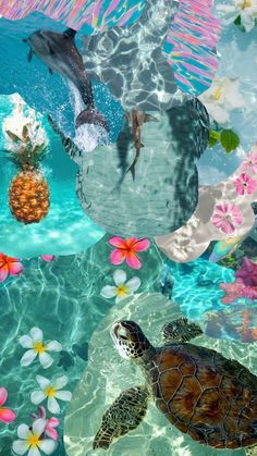 a turtle swimming in the ocean surrounded by flowers and pineapples