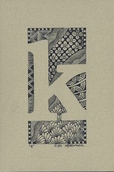 the letter k is made up of black and white designs