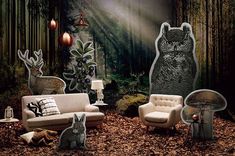 a living room filled with furniture and lots of forest animals on the wall next to it