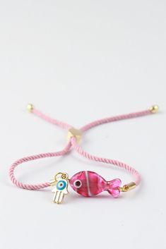 Murano Glass Fish Bracelet, lampwork pink fish jewelry, Beaded bracelet for kids and girls, handcrafted friendship bracelet, new year gift  Cute and minimal. It can be used for adults and children thanks to its adjustable rope feature. Bracelet is adjustable. Your orders will be delivered within 5 -7 working days after they are shipped. Minimalist Beads Jewelry, Pink Round Beads Charm Bracelet For Gift, Pink Charm Bracelet With Round Beads For Gift, Pink Charm Bracelet With Round Beads As Gift, Pink Adjustable Charm Bracelet For Friendship, Handmade Pink Charm Bracelet For Friendship, Adjustable Playful Jewelry For Gift Making, Playful Pink Beaded Bracelets As Gift, Adjustable Playful Pink Jewelry