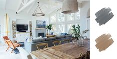 a living room filled with furniture next to a dining room table and tv mounted on the wall