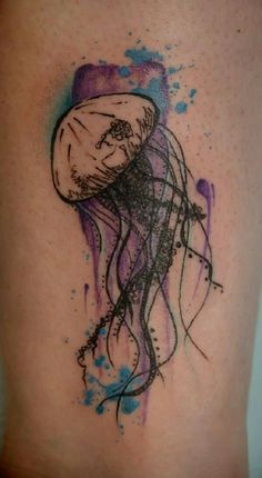 a tattoo with a jellyfish on it