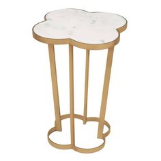 a white and gold side table with a flower design on the top, in front of a white background