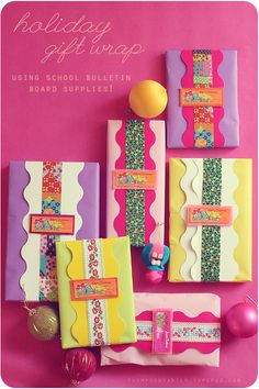 the cover of a book with colorful paper and decorations on it's sides, including gifts