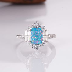 Sea Blue Fire Opal Ring in sterling silver with blue opal Sea Ring, Sea Rings, Blue Fire Opal, Small Crystals, Fire Opal Ring, Blues And Greens, Beautiful Sea, Blue Fire, Salt And Pepper Diamond