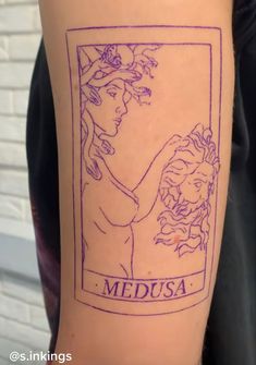 a woman's arm with a stamp on it that says medusa in purple ink