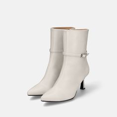 Stylish short boots with a pointed toe are accented with decorative ankle straps. This is an excellent pair that can be used with a wide range of outfits, including pants styles, skirts, and tights. Chic White High Ankle Mid-calf Boots, Elegant White Mid-calf Boots With Pointed Toe, Elegant White Pointed Toe Mid-calf Boots, White Faux Leather Pointed Toe Mid-calf Boots, Beige Pointed Toe Mid-calf Boots Medium Width, Of Outfits, Strap Design, Pumps Flat, Ankle Straps