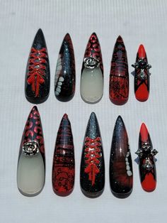 Size small Lace accents, molded ribbons, and y2k goth inspired Frenchies XL stiletto, thumb to pinky: 4(15mm), 8(11), 7(12), 8(11), 11(8) 10pc nail set with nail application kit (cuticle pusher, glue, adhesive tabs, buffing block, and alcohol wipes) Application: 1. Ensure your hands are washed and clean before application  2. Compare press on to fingernail and make sure they fit. If not, file away any excess to fit to your nail bed 3. Gently push back cuticles with cuticle pusher, and remove shi Stitches Nails, Matching Couple Nails Goth, Nail Inspo Goth, Creepy Cute Nails, Goth Acrylic Nail Designs, Centipede Nails, Bone Nails, Alt Press On Nails, Punk Press On Nails