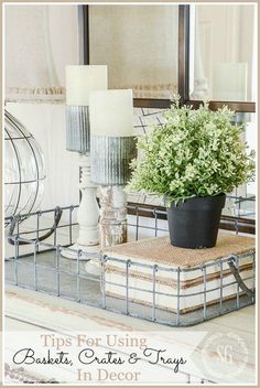 a table topped with a potted plant next to a mirror