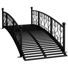 a black metal bed frame with intricate designs on the headboard and foot board, isolated against a white background