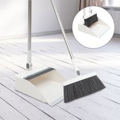 a broom and dust mop sitting on top of a wooden floor