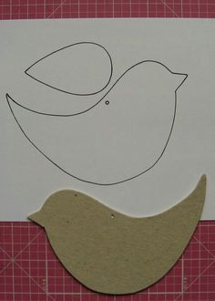 a piece of paper cut out to look like a bird