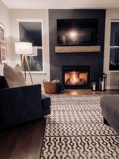 the living room is clean and ready for us to use it's new fireplace