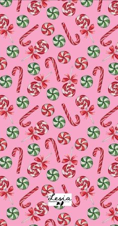 candy canes and candies on pink background with green, red and white stripes