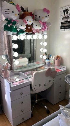 a hello kitty themed bedroom vanity and mirror