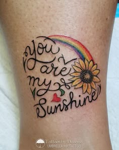 a sunflower with the words you are my sunshine written in cursive writing