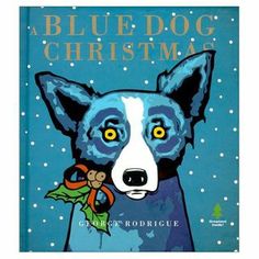 a blue dog christmas book with a black and white dog in it's head