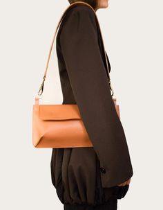 Edie Bag in natural brown leather | NOT JUST A LABEL Leather Baguette Bag With Detachable Strap For Everyday, Everyday Leather Baguette Bag With Detachable Strap, Modern Everyday Leather Clutch, Modern Leather Clutch For Everyday, Leather Baguette Clutch Bag For Travel, Modern Leather Baguette Bag With Leather Handles, Office Clutch Baguette Bag With Removable Pouch, Office Baguette Clutch With Removable Pouch, Trendy Leather Clutch Baguette Bag