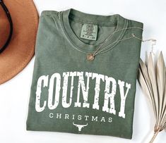 Comfort Colors® Country Christmas Shirt, Western Holiday Tee, Cowboy Christmas Crewneck, Country Xmas Top, Cowgirl Christmas Shirt ### Size and Fit Guide ### We exclusively use Comfort Colors Heavyweight brand t-shirts for listings where "Comfort Colors" is specified in the title. These unisex shirts are designed with a relaxed fit. For a more tailored appearance, we recommend ordering one size down. Each shirt is custom-made to your specifications, so please review our detailed size and color charts carefully before placing your order. Returns or exchanges can be challenging due to the personalized nature of our products. If you need any help with sizing or color selection, feel free to reach out to us. ### Ordering Multiple Shirts ### 1. Select your preferred size and color from the drop Country Christmas Outfits, Country Christmas Shirts, Cowgirl Christmas, Cowboy Christmas, Christmas Crewneck, Country Christmas, Color Charts, Unisex Shirts, Christmas Shirt