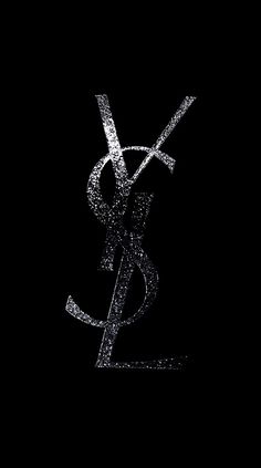 the letter y is made up of silver sparkles on a black background with an elegant monogramic effect